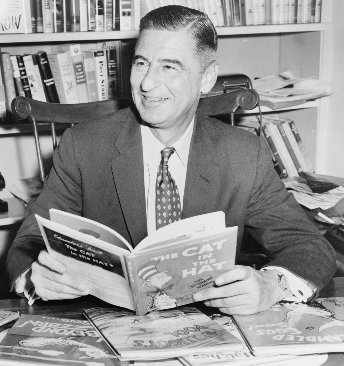 Dr. Seuss poses with The Cat in the Hat and other books, c. 1957 Dr. Seuss poses with The Cat in the Hat and other books, c. 1957