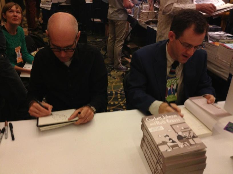 Daniel Clowes and Philip Nel signing books at the Fantagraphics booth. Photo by Alvin Buenaventura. Daniel Clowes and Philip Nel signing books at the Fantagraphics booth. Photo by Alvin Buenaventura.